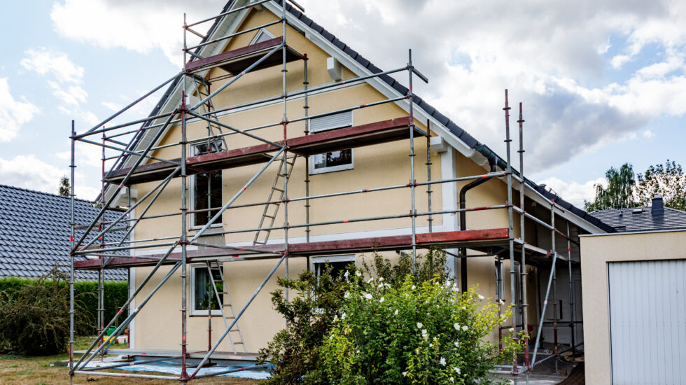Single-family house with scaffolding
